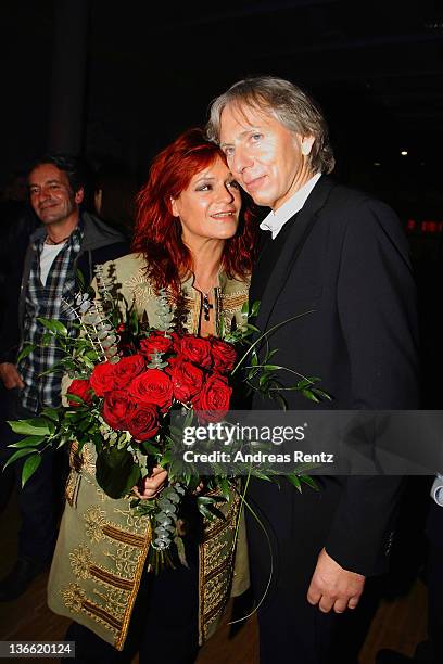 Singer Andrea Berg and her husband Uli Ferber smile at the aftershow party to the 'Abenteuertour' 2012 premiere at Hanns-Martin-Schleyer-Halle on...