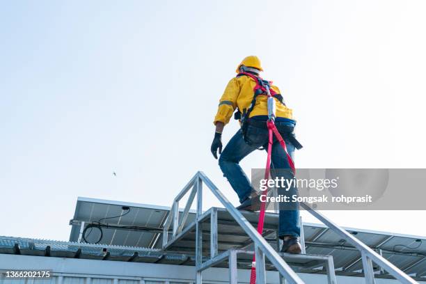 engineer doing inspection in construction site - building top foto e immagini stock