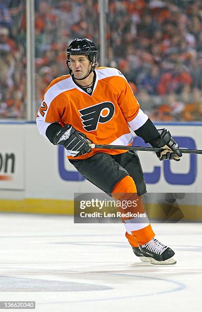 Derian Hatcher of the Philadelphia Flyers skates against the New York Rangers during the Alumni Game prior to the 2012 NHL Bridgestone Winter Classic...