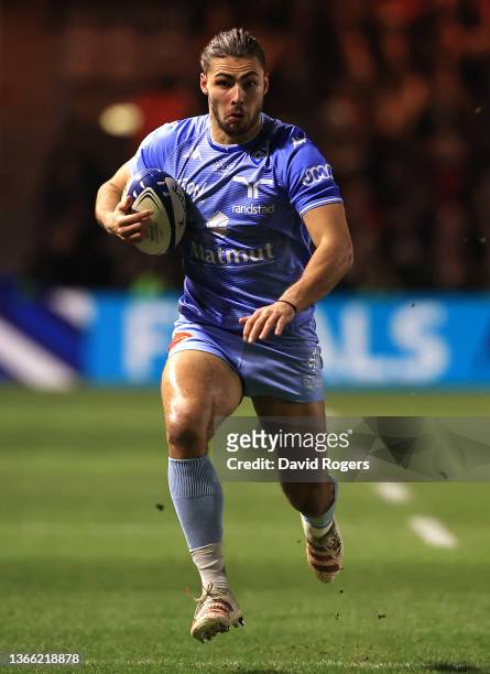 Antoine Zeghdar of Castres runs with the ball during the Heineken Champions Cup match between Harlequins and Castres Olympique at The Stoop on...