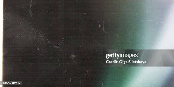 film glare, noise and scratches on a black background - image type stock pictures, royalty-free photos & images