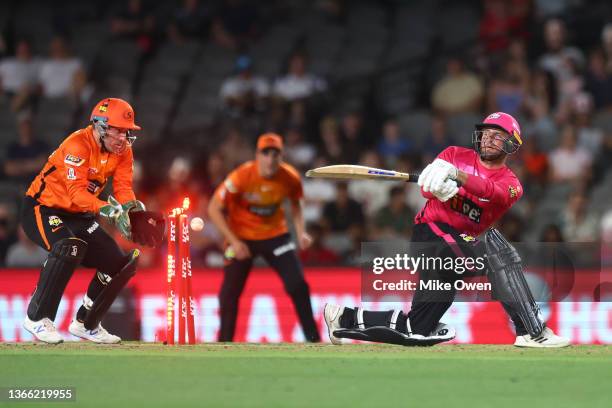 Nick Bertus of the Sixers is bowled out by Ashton Agar of the Scorchers during the Men's Big Bash League match between the Perth Scorchers and the...