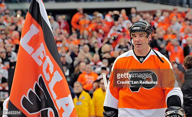 John LeClair of the Philadelphia Flyers walks toward the rink during player introductions before his game against the New York Rangers during the...