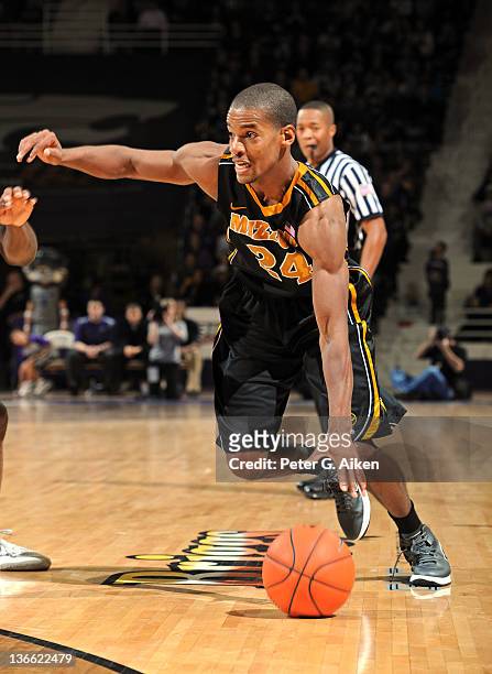 Guard Kim English of the Missouri Tigers drives against the Kansas State Wildcats during the first half on January 7, 2012 at Bramlage Coliseum in...