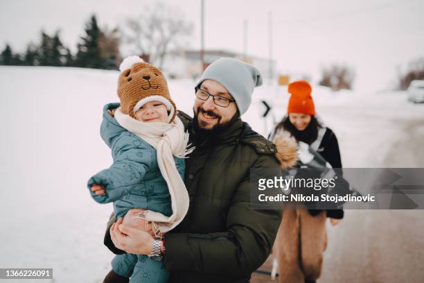 sleighing time! - winter baby stockfoto's en -beelden