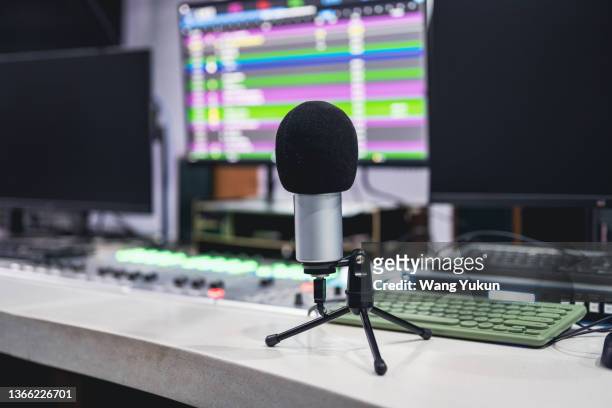 close-up of recording equipment in the live room of a radio station - live broadcast stock pictures, royalty-free photos & images
