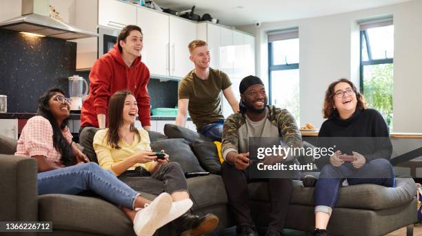 university students relaxing - college dorm stock pictures, royalty-free photos & images