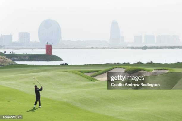 Victor Dubuisson of France plays his second shot on the eighteenth hole during the Third Round of the Abu Dhabi HSBC Championship at Yas Links Golf...