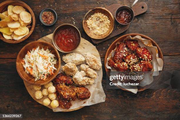 asian-style barbecue chicken drumsticks and wings - cheese ball stock pictures, royalty-free photos & images