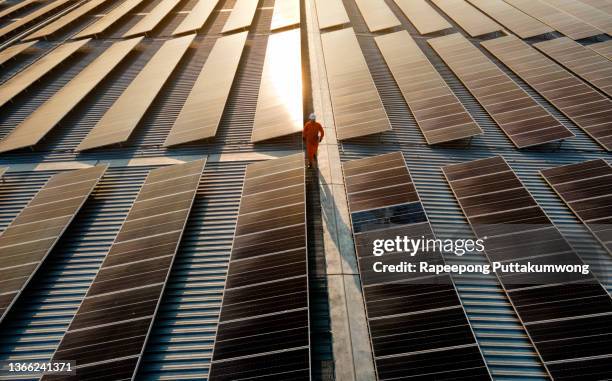engineer working on checking and maintenance equipment at industry solar power. - central eléctrica fotografías e imágenes de stock