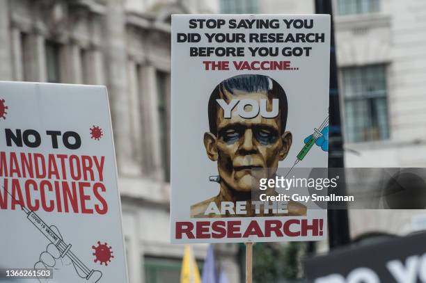 Protestors begin their march from the BBC to Parliament square, joined by NHS workers unhappy about compulsory vaccination, during the World Wide...