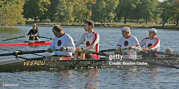 Visiting German boat, senior masters four with coxswain pushes off from Northeastern's Henderson Boathouse onto the Charles River in preparation for...