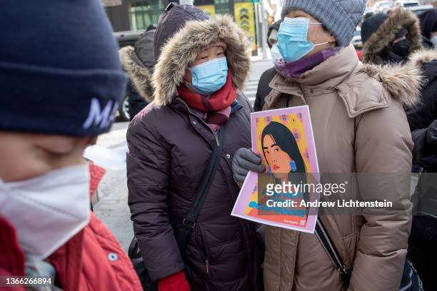 Press conference and memorial vigil is held for Yao Pan Mo on the street corner where he was beaten, January 21, 2022 in Harlem, New York City. Pan...