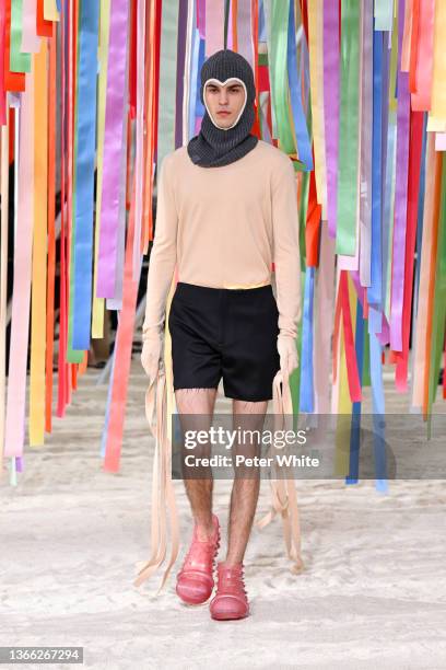 Model walks the runway during the Loewe Menswear Fall/Winter 2022-2023 show as part of Paris Fashion Week on January 22, 2022 in Paris, France.