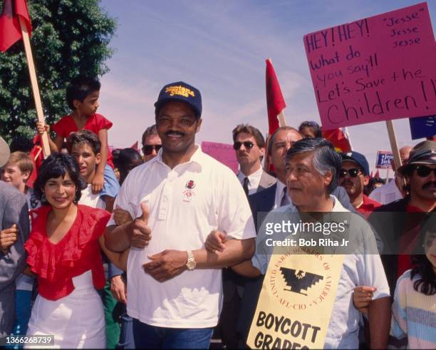 McFARLAND, CALIFORNIA United Farm Workers President Cesar Chavez and Presidential candidate Jesse Jackson during a Farmworkers support walk, June 4,...