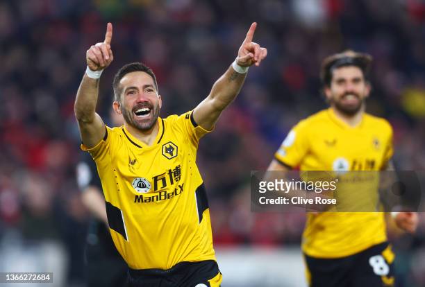 Joao Moutinho of Wolverhampton Wanderers celebrates after scoring their side's first goal during the Premier League match between Brentford and...