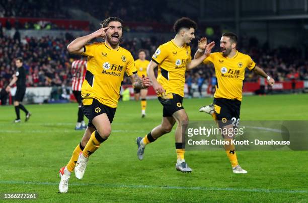 Ruben Neves of Wolverhampton Wanderers celebrates scoring his teams second goal during the Premier League match between Brentford and Wolverhampton...