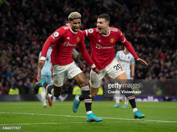 Marcus Rashford of Manchester United celebrates scoring with team mate Diogo Dalot during the Premier League match between Manchester United and West...