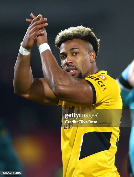 Adama Traore of Wolverhampton Wanderers applauds the fans after the Premier League match between Brentford and Wolverhampton Wanderers at Brentford...