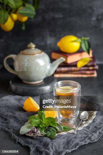 freshly brewed herbal tea with mint, sage, thyme, lemon and honey - tea sage stock pictures, royalty-free photos & images