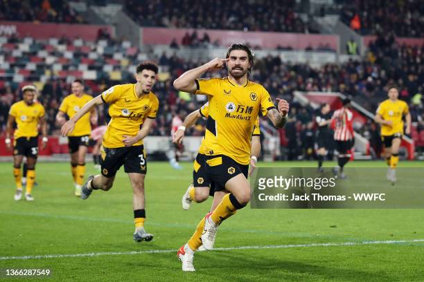 Ruben Neves of Wolverhampton Wanderers celebrates after scoring his team's second goal during the Premier League match between Brentford and...