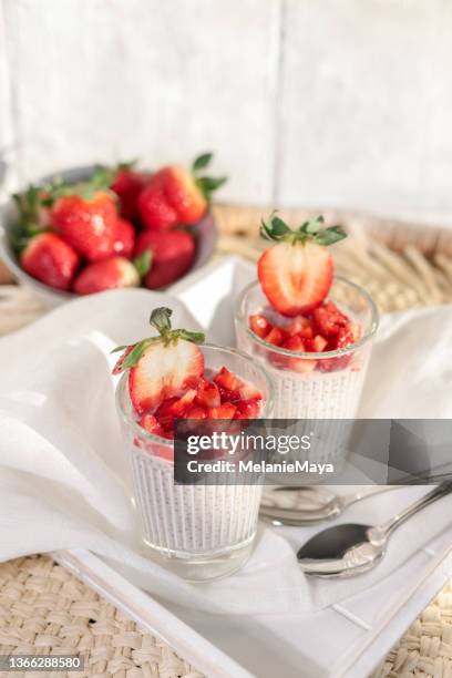 strawberry coconut chia pudding dessert glasses with fresh fruit - pudding stock pictures, royalty-free photos & images