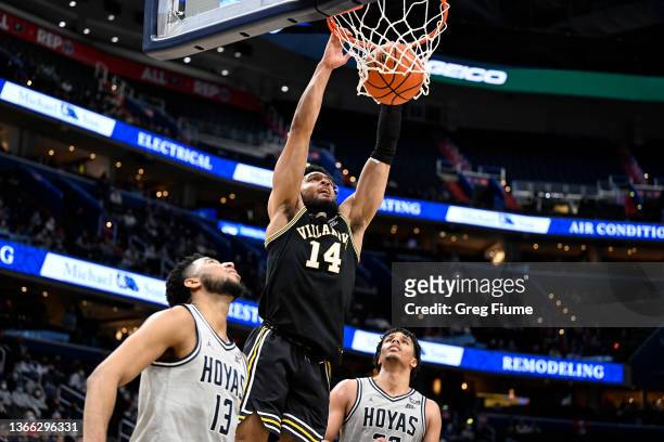 Caleb Daniels of the Villanova Wildcats dunks the ball in the second half against the Georgetown Hoyas at Capital One Arena on January 22, 2022 in...