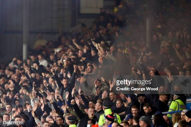 Newcastle United fans celebrate their first goal during the Premier League match between Leeds United and Newcastle United at Elland Road on January...