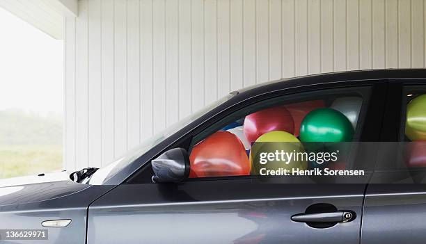 car filled with ballons - stationery close up stock pictures, royalty-free photos & images