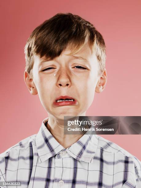 portrait of young boy crying  with funny face - cried stock pictures, royalty-free photos & images