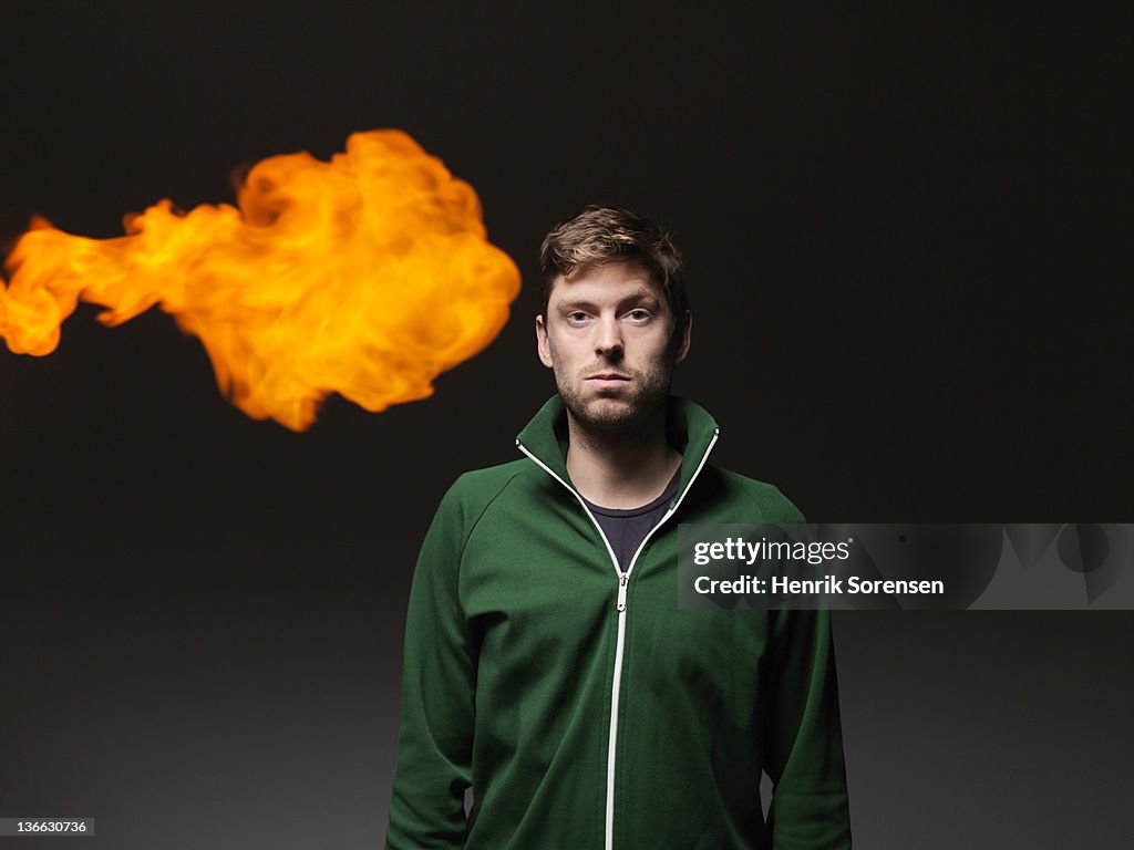 Young man with fireball
