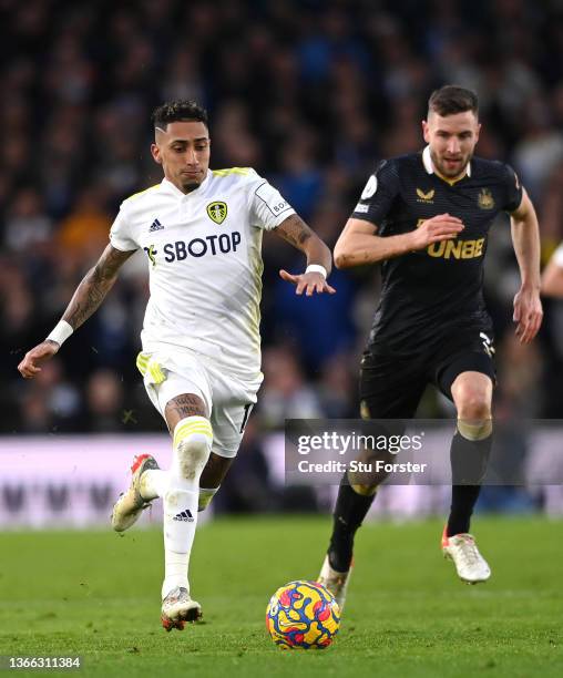 Leeds player Raphinha outpaces Paul Dummett during the Premier League match between Leeds United and Newcastle United at Elland Road on January 22,...