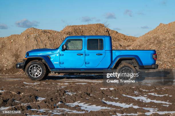 jeep gladiator on a road - 4x4 stock pictures, royalty-free photos & images