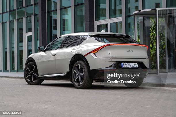 kia ev6 on a street - kia stock pictures, royalty-free photos & images