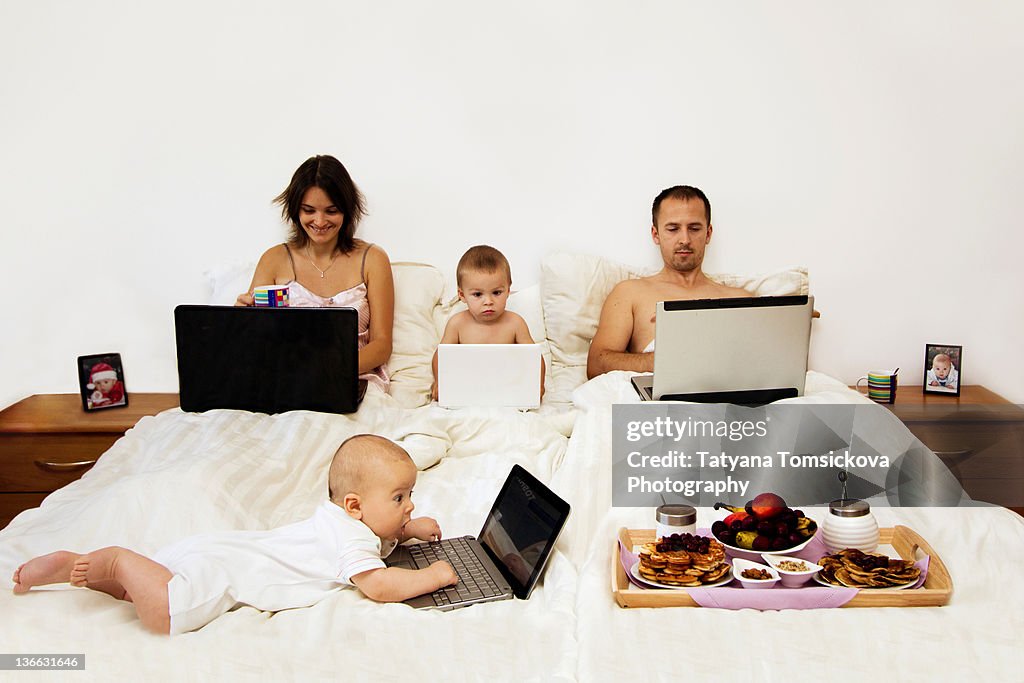 Family using laptop