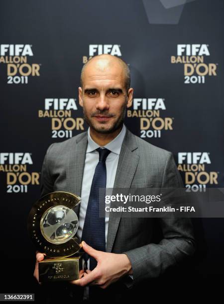 Pep Guardiola with his trophy after winning the FIFA World Coach of the Year for Men's Football award at the FIFA Ballon d'Or Gala 2011 at the...