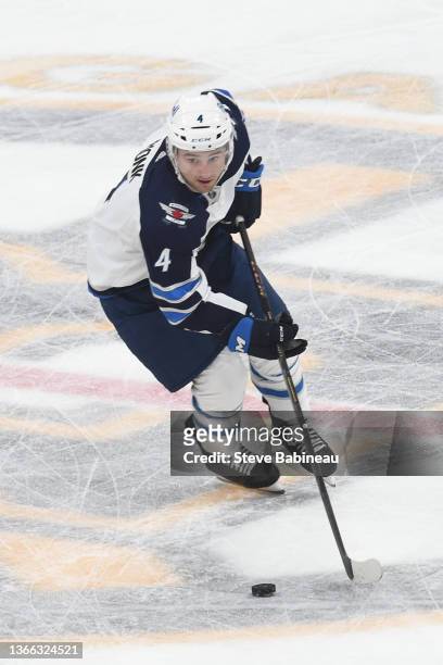 Neal Pionk of the Winnipeg Jets skates against the Boston Bruins at the TD Garden on January 22, 2022 in Boston, Massachusetts.