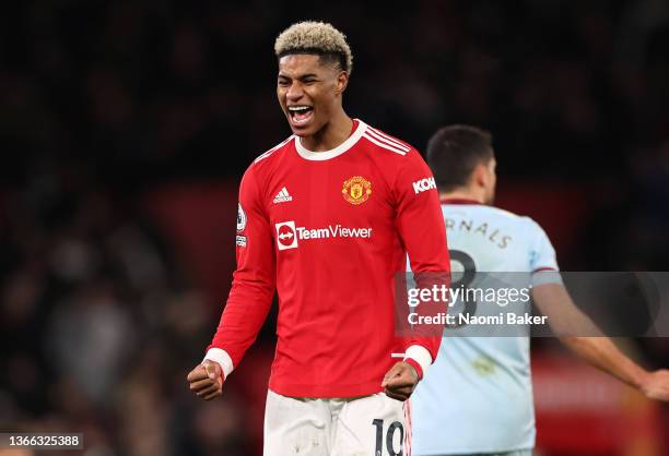 Marcus Rashford of Manchester United celebrates at the full time whistle during the Premier League match between Manchester United and West Ham...