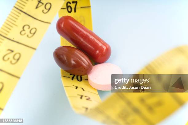 weight losing - exercise pill stock-fotos und bilder