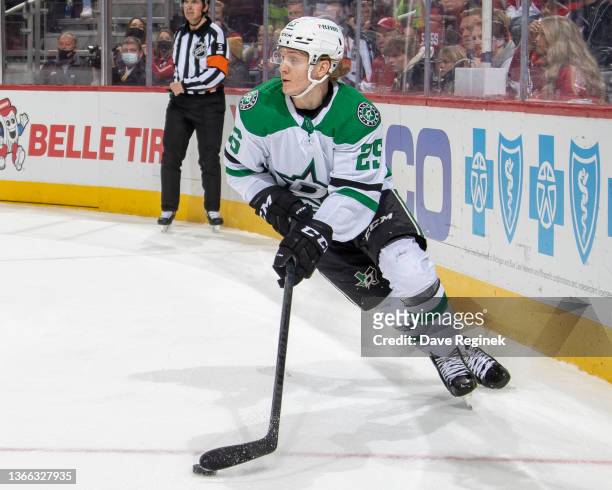 Joel Kiviranta of the Dallas Stars skates around the net with the puck against the Detroit Red Wings during the second period of an NHL game at...