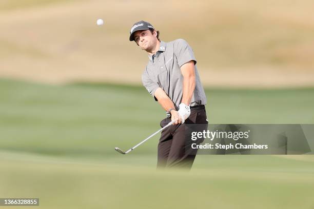 Davis Riley chips on the 16th hole during the third round of the The American Express at the Stadium Course at PGA West on January 22, 2022 in La...