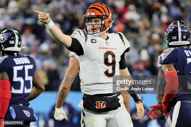 Quarterback Joe Burrow of the Cincinnati Bengals celebrates after rushing for a third quarter first down against the Tennessee Titans in the AFC...