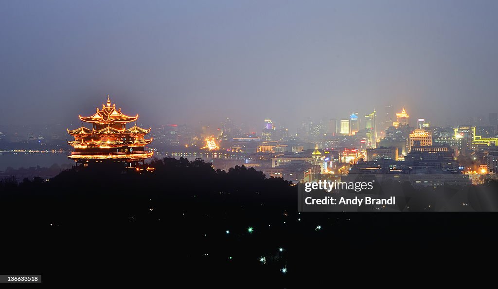 City god pagoda and Hangzhou Cityscape at Night