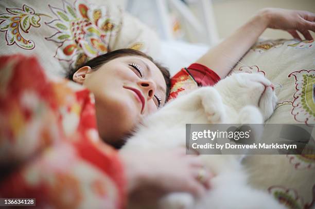 Sleeping woman in kimono with cat