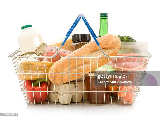 a shopping basket filled with food - shopping basket stock pictures, royalty-free photos & images