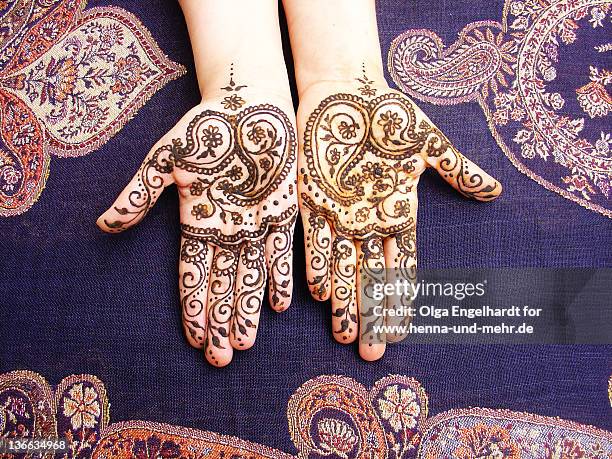 henna with indian paisley on two hands - indian paisley stock pictures, royalty-free photos & images