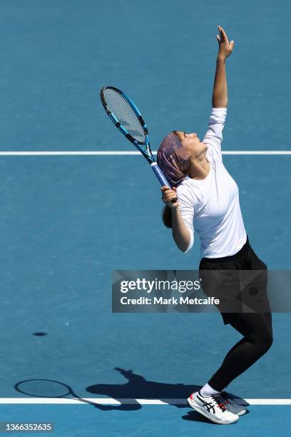 Meshkatolzahra Safi of Iran serves in her round one junior girls singles match against Anja Nayar of Australia during day seven of the 2022...