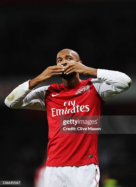 Thierry Henry of Arsenal celebrates at the end of the FA Cup Third Round match between Arsenal and Leeds United at the Emirates Stadium on January 9,...
