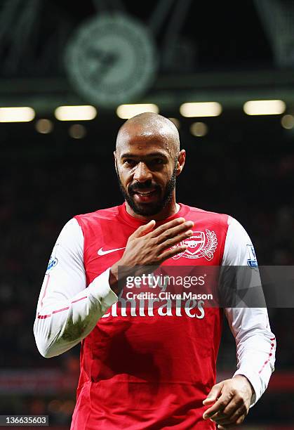 Thierry Henry of Arsenal celebrates at the end of the FA Cup Third Round match between Arsenal and Leeds United at the Emirates Stadium on January 9,...