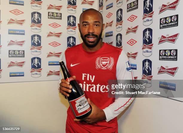 Thierry Henry recieves the man of the match award after the FA Cup Third Round match between Arsenal and Leeds United at Emirates Stadium on January...